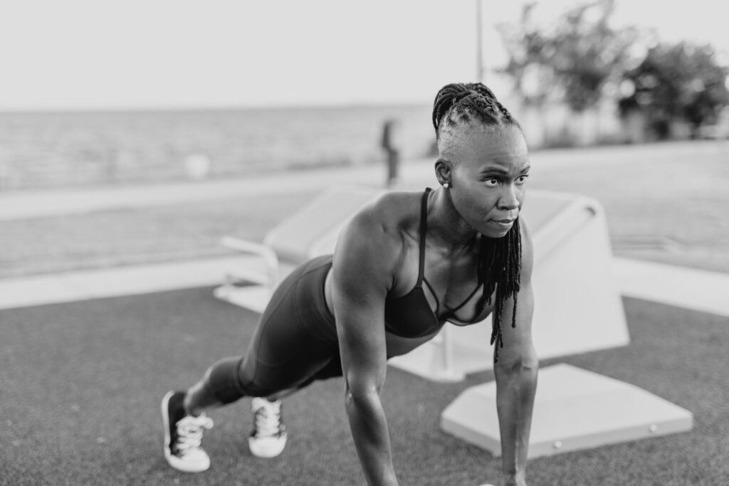 Candace does a plank while looking fiercely ahead